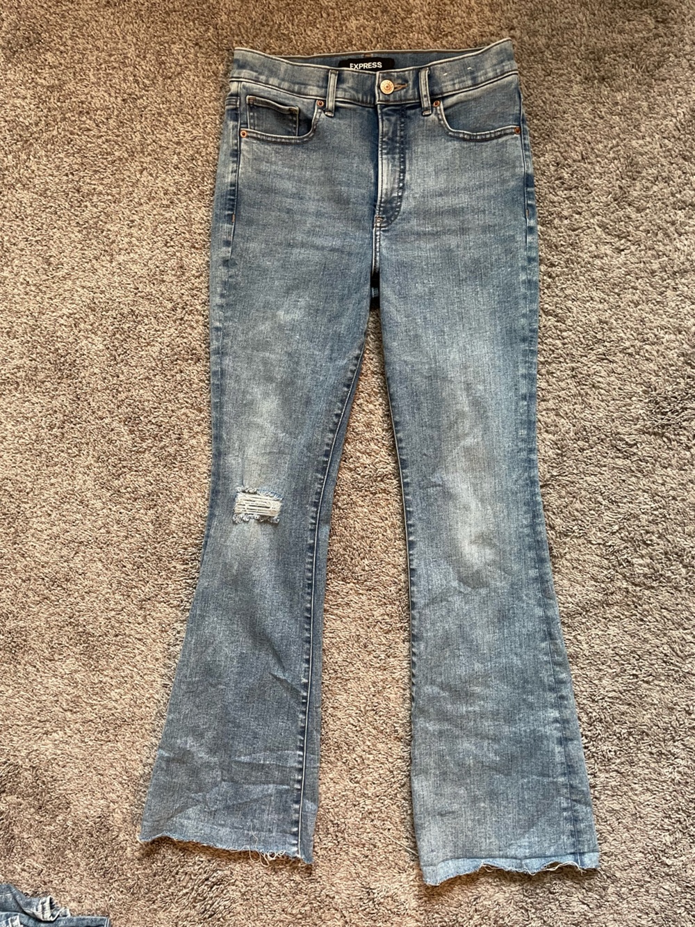 Express women's faded blue flared jeans